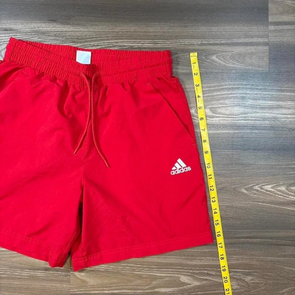 Red Adidas shorts size M